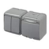 JUNIOR Łącznik świecznikowy z gniazdem pojedynczym z uziemieniem 2P+Z (klapka popielata; przesłony t