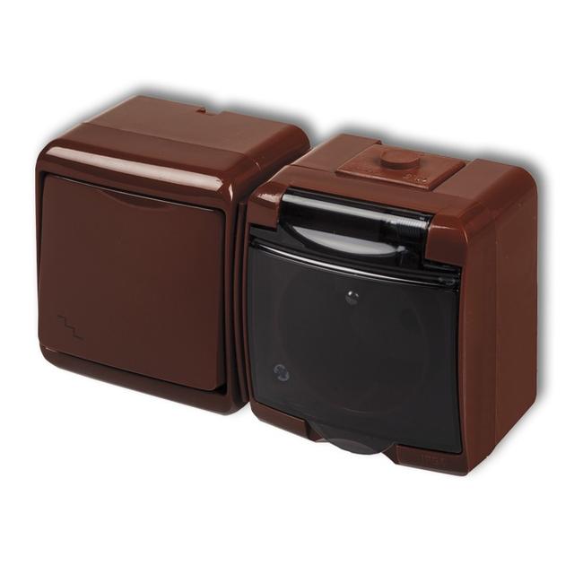 JUNIOR Łącznik schodowy z gniazdem pojedynczym z uziemieniem 2P+Z (klapka dymna; bez przesłon) brązo