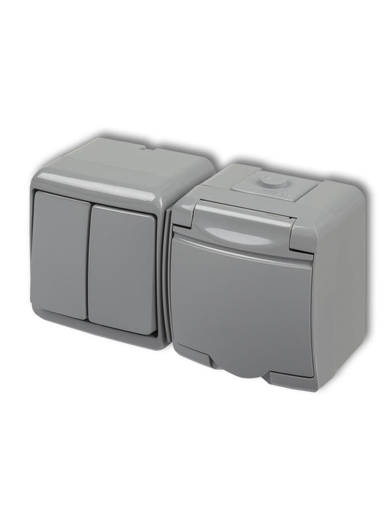 JUNIOR Łącznik świecznikowy z gniazdem pojedynczym z uziemieniem 2P+Z (klapka popielata; przesłony t